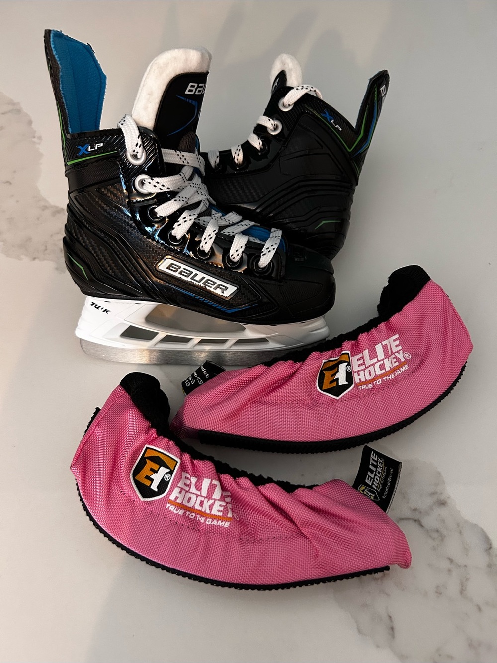 Bauer XLP Black Ice Hockey Skates with Pink Elite Hockey Blade Covers